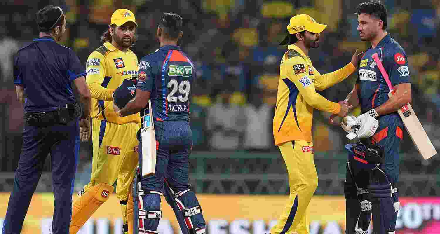 Lucknow Super Giants batters Nicholas Pooran and Marcus Stoinis being greeted by CSK's. Lucknow Super Giants batters Nicholas Pooran and Marcus Stoinis being greeted by CSK's.