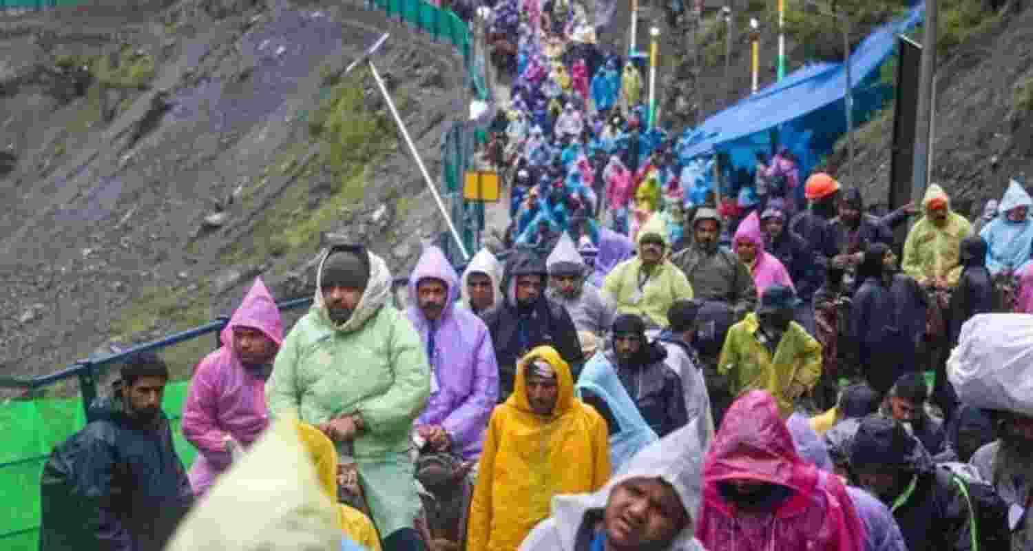 Devotees make their way to the Amarnath cave shrine as the annual Yatra witnesses a surge in pilgrim footfall this year. Devotees make their way to the Amarnath cave shrine as the annual Yatra witnesses a surge in pilgrim footfall this year.