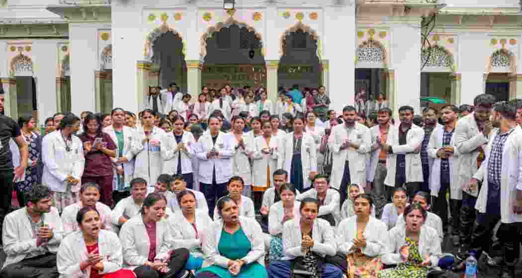 Medical professionals demonstrate demanding justice for the murdered trainee doctor in Kolkata, as a nationwide strike disrupts health services across India. Medical professionals demonstrate demanding justice for the murdered trainee doctor in Kolkata, as a nationwide strike disrupts health services across India.