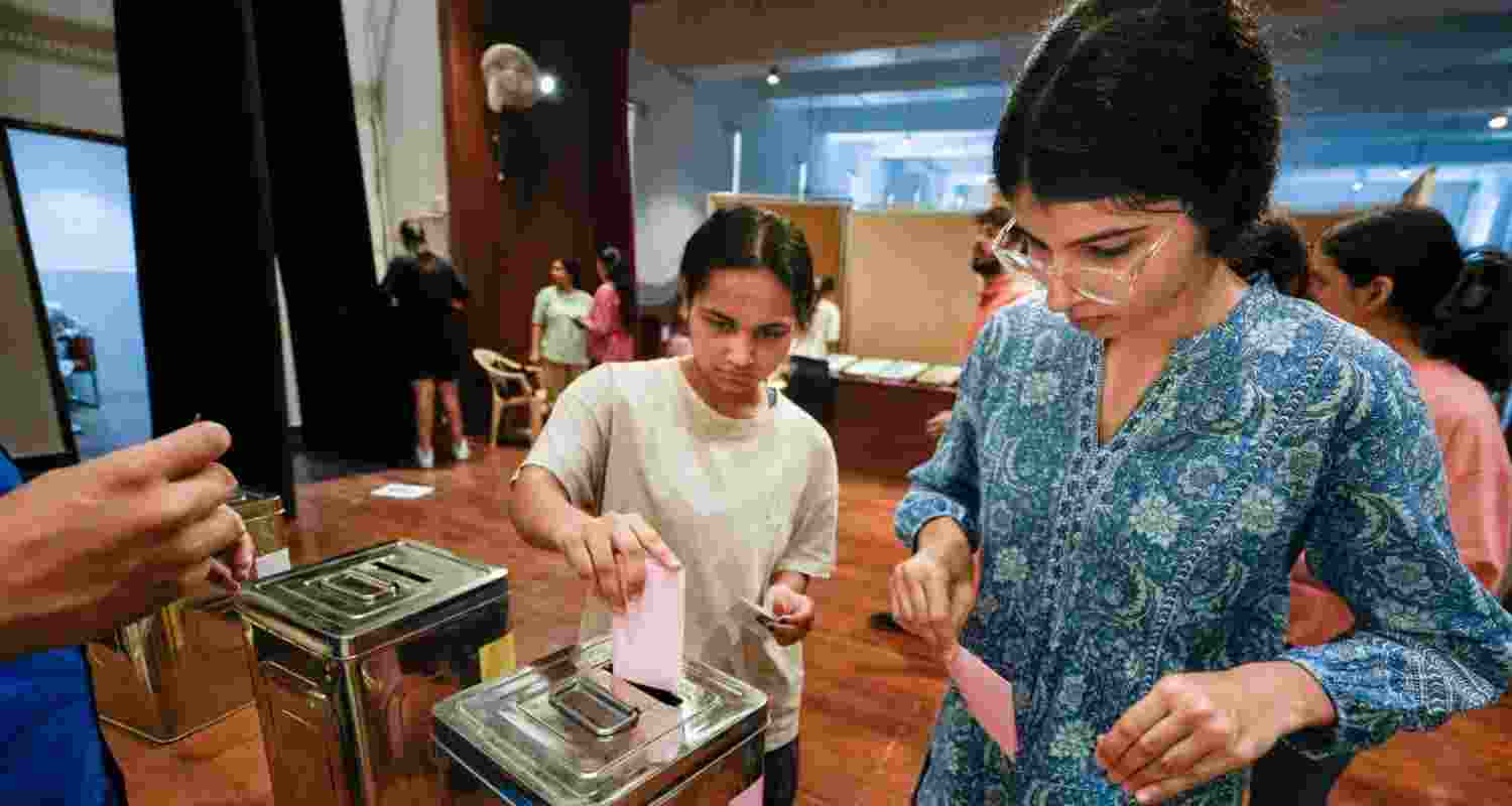 Students cast their votes during the Delhi University Students' Union (DUSU) polls 2024, at Miranda House college, in New Delhi, Friday. Students cast their votes during the Delhi University Students' Union (DUSU) polls 2024, at Miranda House college, in New Delhi, Friday.