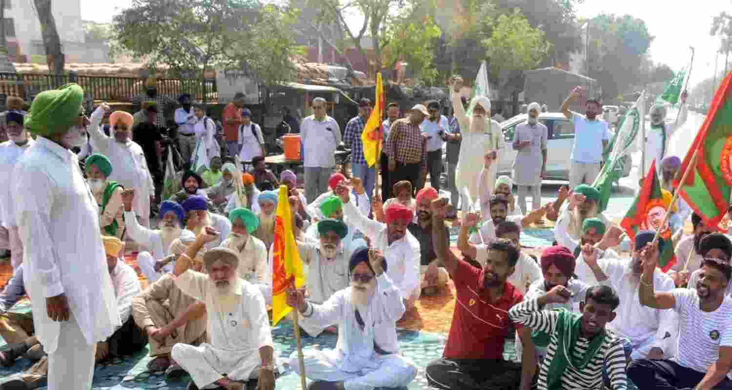 Farmers stage a road blockade at Shambhu after Haryana Police sealed the Punjab-Haryana border as part of their 'Delhi Chalo' protest against the proposed India-US trade agreement. Farmers stage a road blockade at Shambhu after Haryana Police sealed the Punjab-Haryana border as part of their 'Delhi Chalo' protest against the proposed India-US trade agreement.