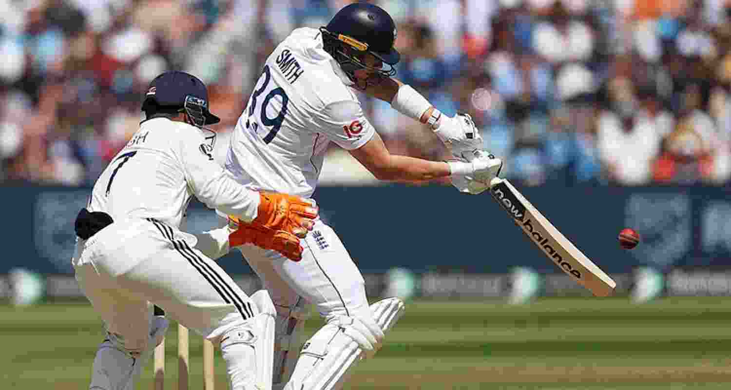 Jamie Smith drives a loose delivery on the off side on the third day of the second Test against India at Edgbaston on Friday. Jamie Smith drives a loose delivery on the off side on the third day of the second Test against India at Edgbaston on Friday.
