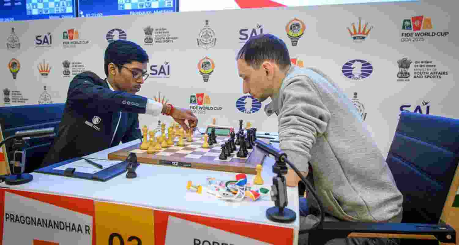 Grandmaster R Praggnanandhaa (left) in action during his Round 3 game at FIDE World Cup in Panaji on Saturday. Grandmaster R Praggnanandhaa (left) in action during his Round 3 game at FIDE World Cup in Panaji on Saturday.
