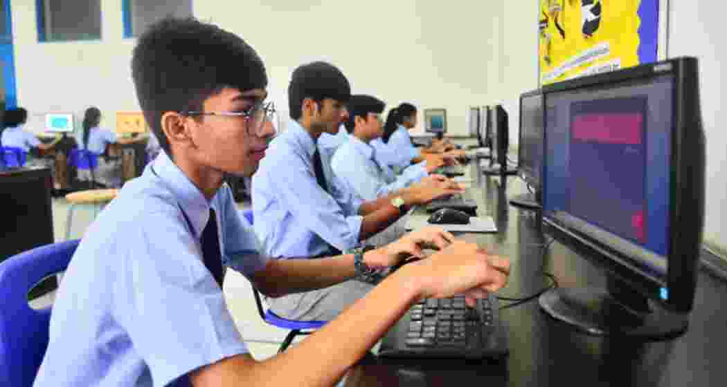 Students attend an online lesson. Students attend an online lesson.