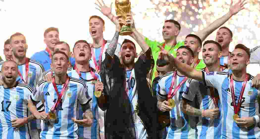 A file photograph of Argentina celebrating with the FIFA World Cup trophy in 2022. Whether they can defend their title remains to be seen. A file photograph of Argentina celebrating with the FIFA World Cup trophy in 2022. Whether they can defend their title remains to be seen.