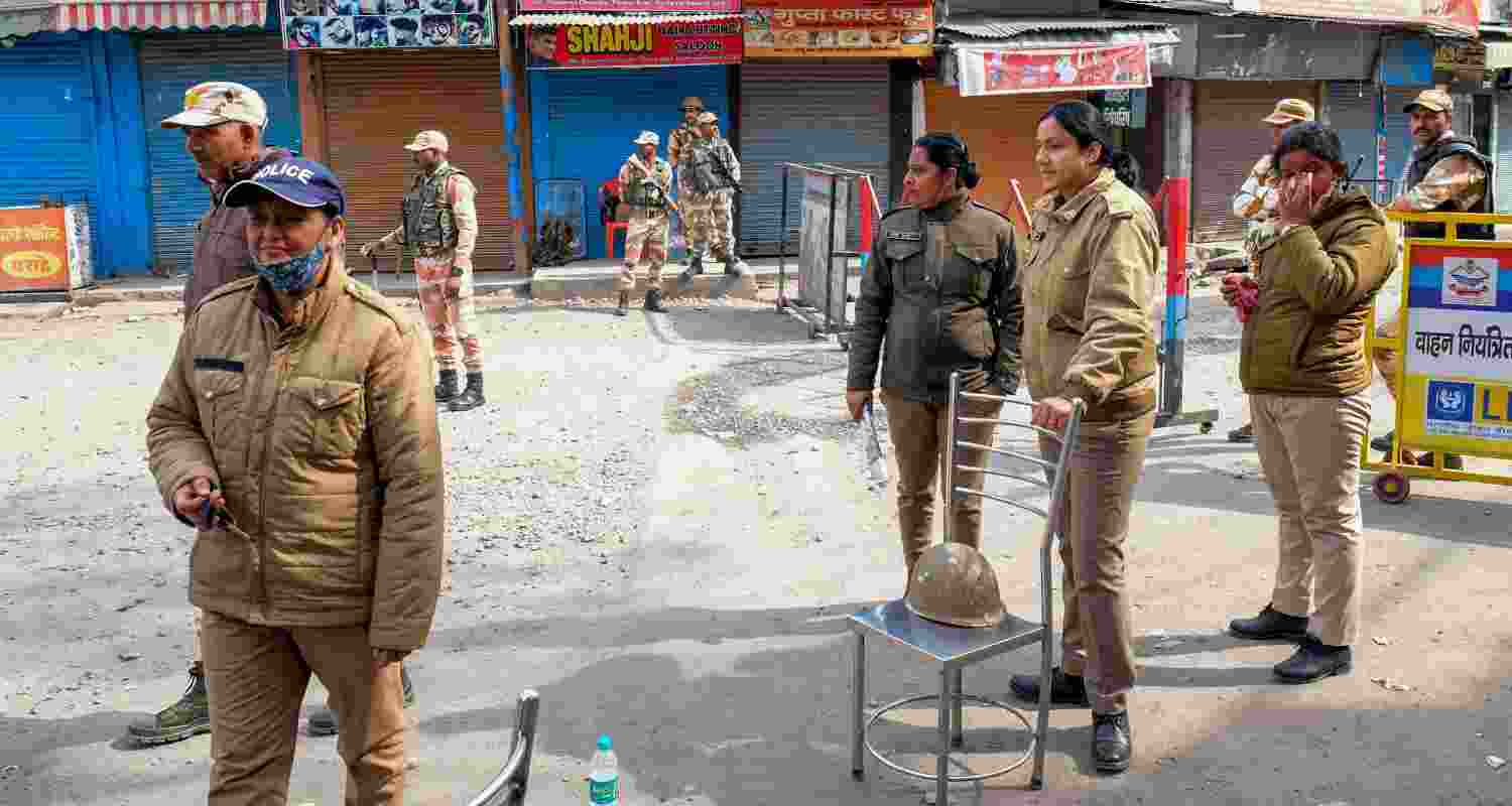 policemen outside shops in Haldwani policemen outside shops in Haldwani