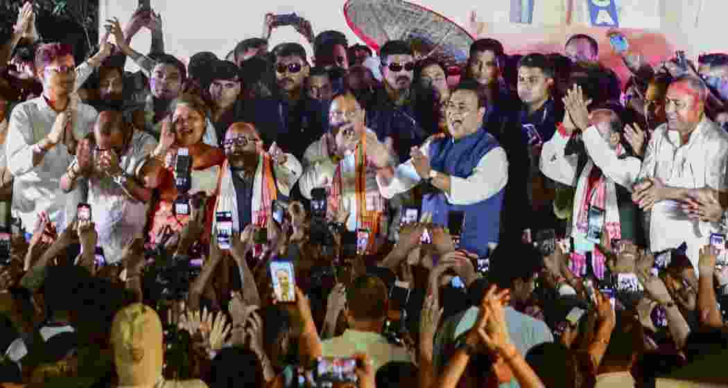 Assam Chief Minister and BJP candidate from Jalukbari constituency, Himanta Biswa Sarma, celebrates with party workers after winning in the state Assembly election results, in Guwahati, on May 4. Assam Chief Minister and BJP candidate from Jalukbari constituency, Himanta Biswa Sarma, celebrates with party workers after winning in the state Assembly election results, in Guwahati, on May 4.