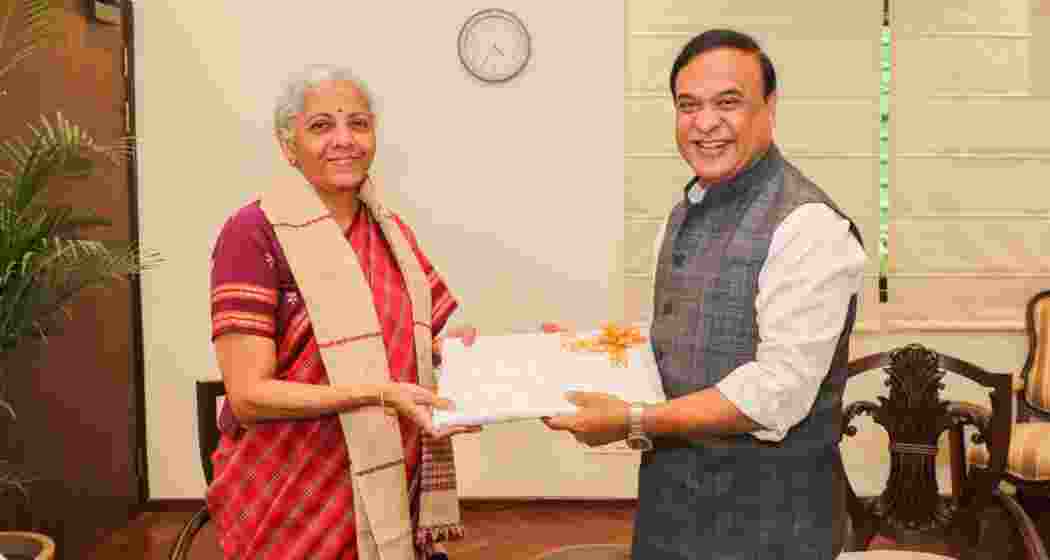 Assam Chief Minister Himanta Biswa Sarma exchanges gifts with Finance Minister Nirmala Sitharaman in New Delhi on Saturday Assam Chief Minister Himanta Biswa Sarma exchanges gifts with Finance Minister Nirmala Sitharaman in New Delhi on Saturday