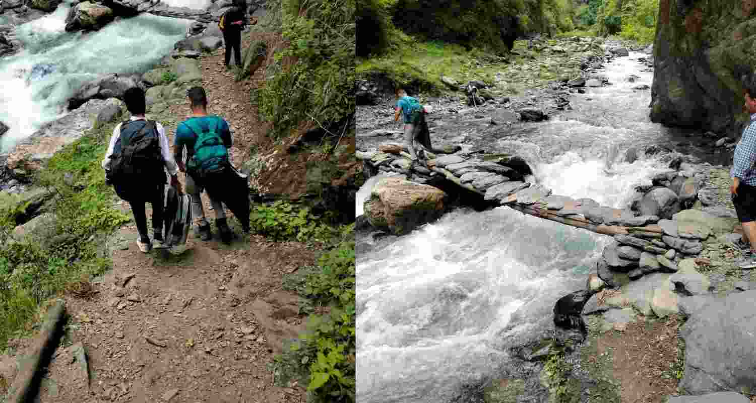 Polling teams in Himachal trek to reach faraway stations. Polling teams in Himachal trek to reach faraway stations.