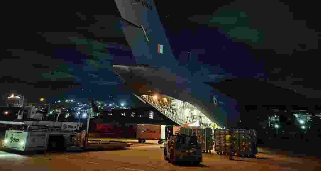 An Indian Air Force C-17 Globemaster III aircraft carrying humanitarian aid is unloaded after landing in Caracas, Venezuela, under Operation Amistad following a 23-hour, 14,000-km transoceanic relief mission from Hindon Air Base. An Indian Air Force C-17 Globemaster III aircraft carrying humanitarian aid is unloaded after landing in Caracas, Venezuela, under Operation Amistad following a 23-hour, 14,000-km transoceanic relief mission from Hindon Air Base.