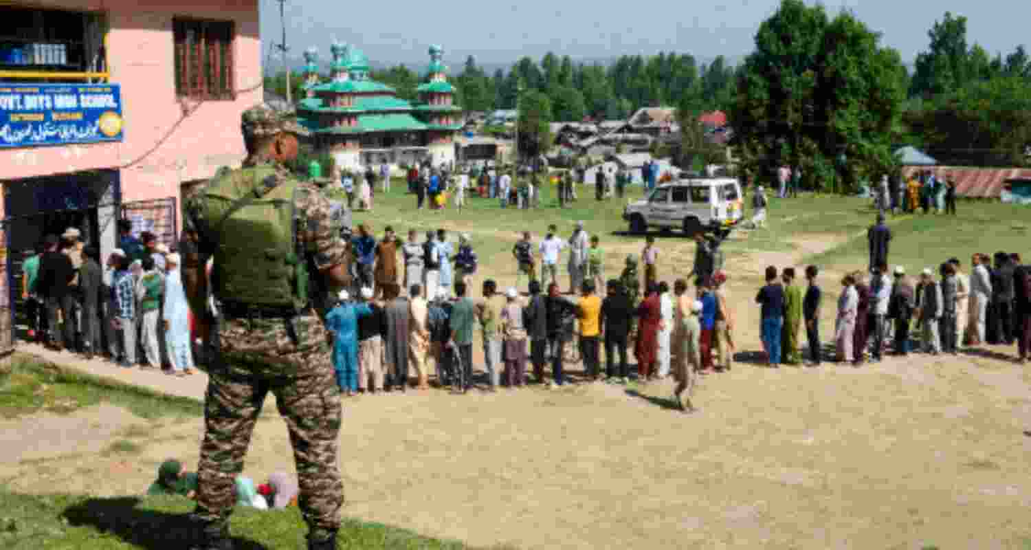 Voters wait to cast their votes during the 5th phase of Lok Sabha elections, in Budgam district of central Kashmir on Monday, May 20, 2024. Voters wait to cast their votes during the 5th phase of Lok Sabha elections, in Budgam district of central Kashmir on Monday, May 20, 2024.