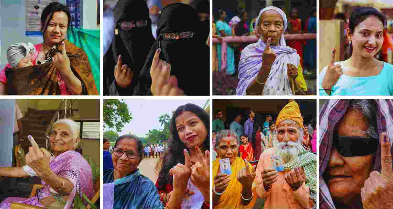 Indian voters showing inked fingers after casting their vote. Indian voters showing inked fingers after casting their vote.