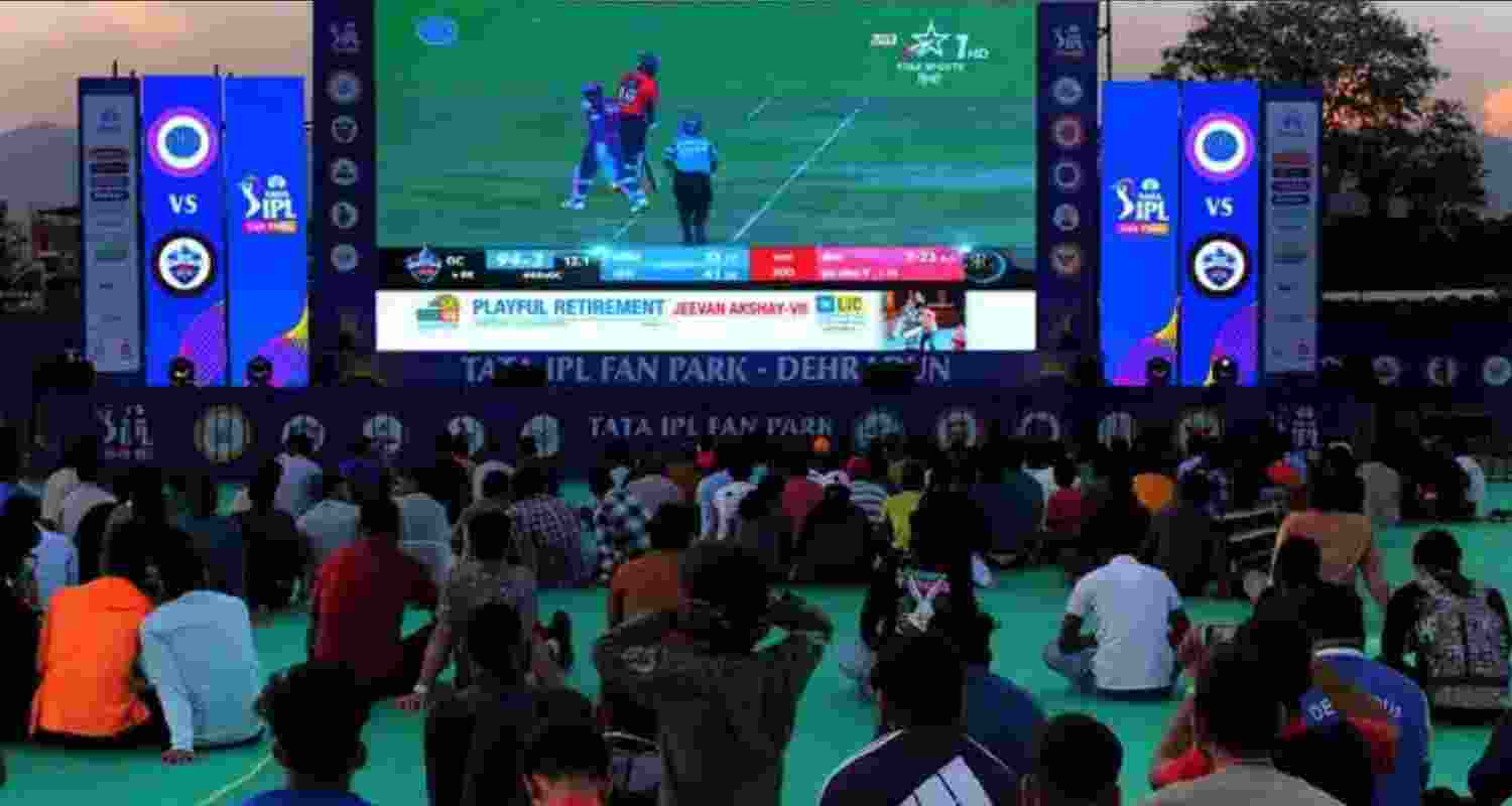 People watching IPL. People watching IPL.