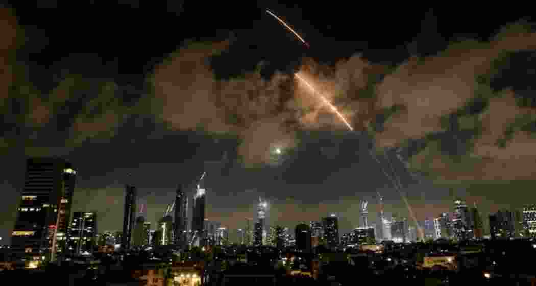 Smoke rises over Tel Aviv after Iran’s missile strike on Wednesday. Smoke rises over Tel Aviv after Iran’s missile strike on Wednesday.