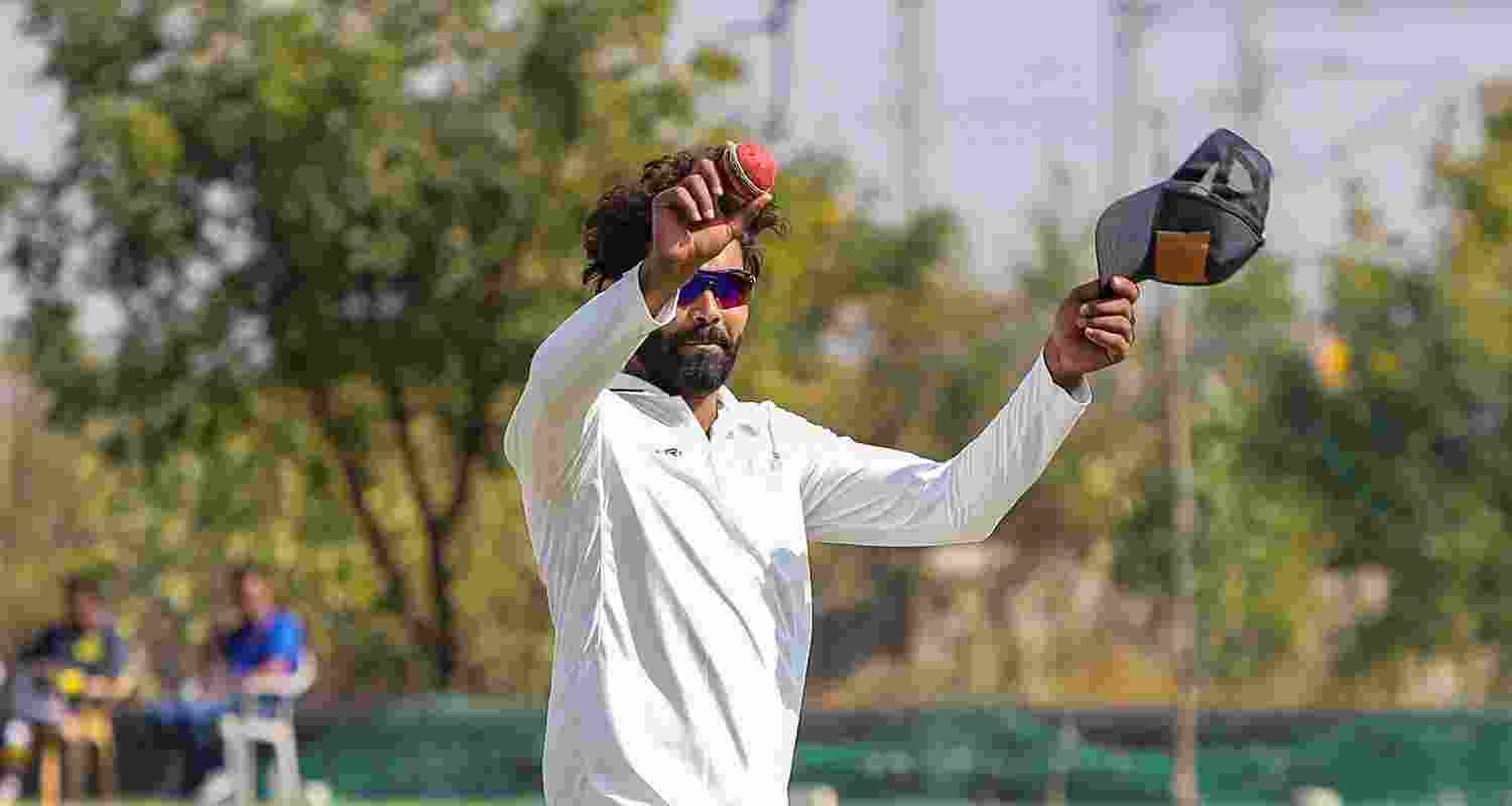 Saurashtra's Ravindra Jadeja celebrates after taking seven wickets at the end of Delhi's second innings on the second day of a Ranji trophy cricket match between Delhi and Saurashtra, at the Niranjan Shah Stadium, in Rajkot. Saurashtra's Ravindra Jadeja celebrates after taking seven wickets at the end of Delhi's second innings on the second day of a Ranji trophy cricket match between Delhi and Saurashtra, at the Niranjan Shah Stadium, in Rajkot.