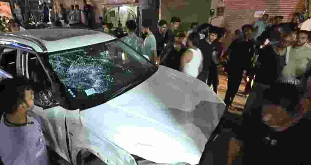 Locals gather at the scene in Jaipur where a speeding SUV driven by an intoxicated man mowed down pedestrians and vehicles over a seven-kilometre stretch, killing three people. Locals gather at the scene in Jaipur where a speeding SUV driven by an intoxicated man mowed down pedestrians and vehicles over a seven-kilometre stretch, killing three people.