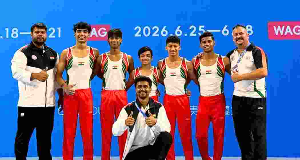 Members of India's junior men's artistic gymnastics pose for photographs after winning the bronze medal at the Asian Championships in Zunyi, China. Members of India's junior men's artistic gymnastics pose for photographs after winning the bronze medal at the Asian Championships in Zunyi, China.