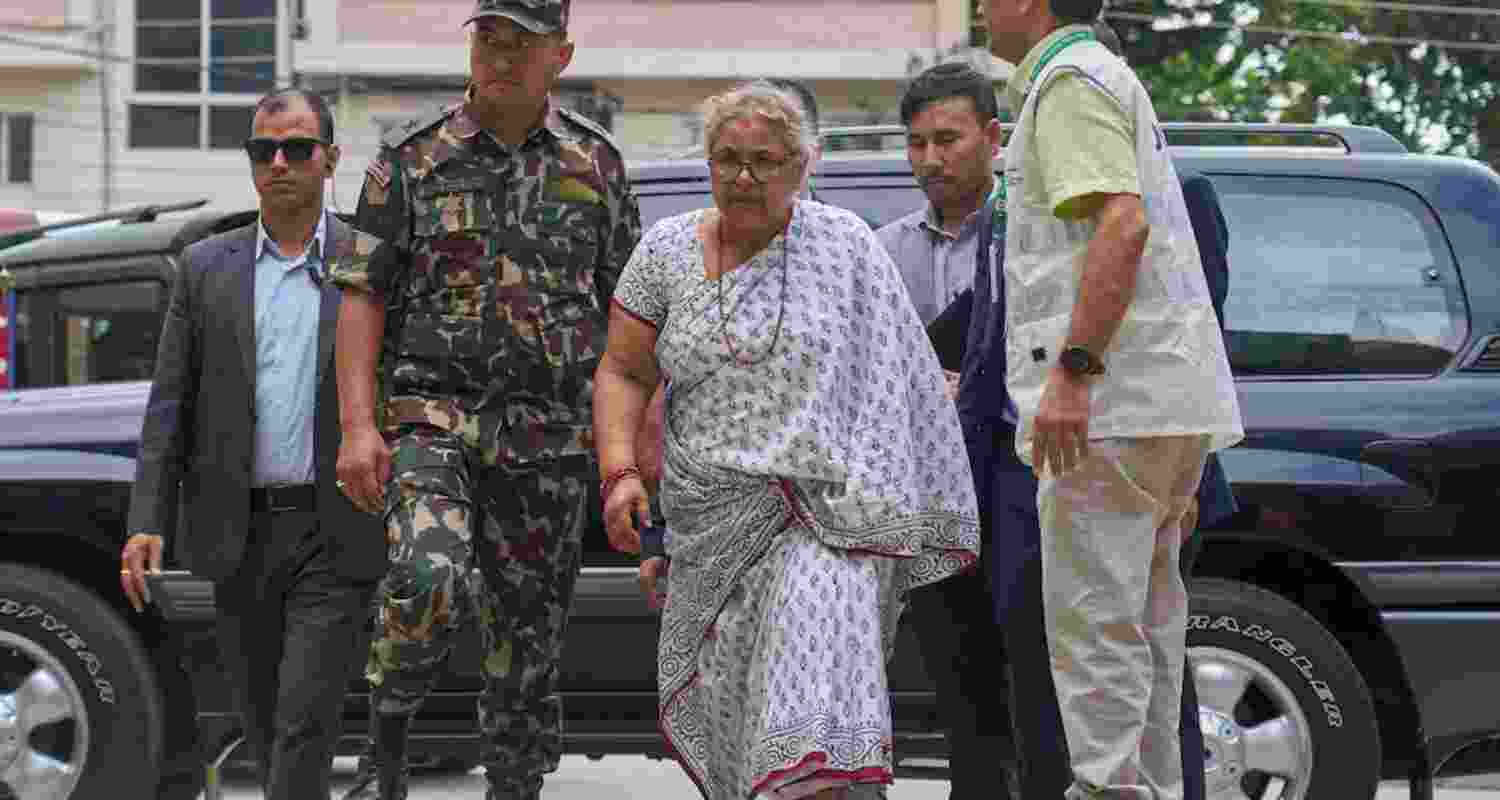 Nepalese residents step out as curfew is lifted in Kathmandu after the appointment of the country’s first woman prime minister, following a week of deadly protests. Nepalese residents step out as curfew is lifted in Kathmandu after the appointment of the country’s first woman prime minister, following a week of deadly protests.