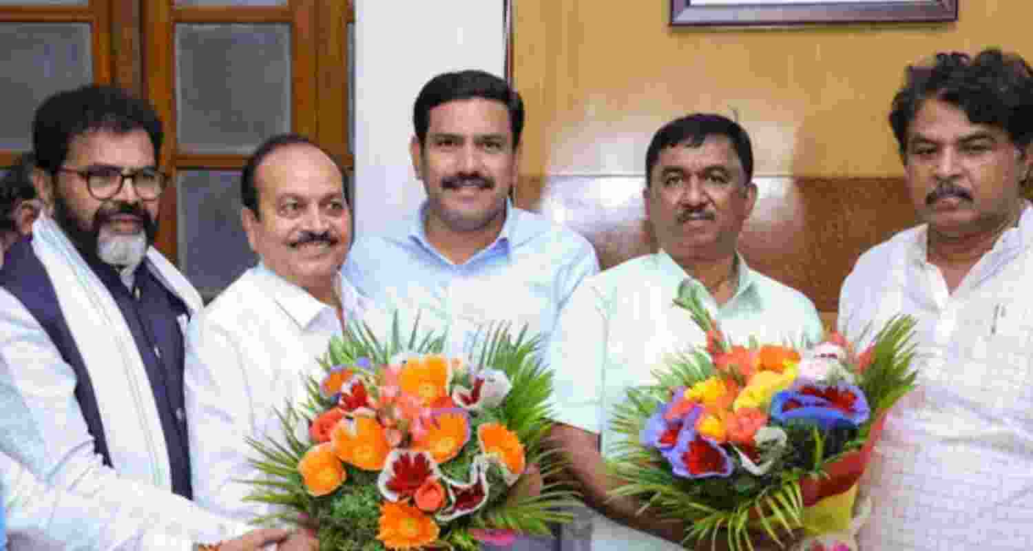 Karnataka Legislative Assembly LoP R Ashoka and state BJP president B Y Vijayendra congratulate party elected candidates Lingaraj Patil and Raghu R. Karnataka Legislative Assembly LoP R Ashoka and state BJP president B Y Vijayendra congratulate party elected candidates Lingaraj Patil and Raghu R.