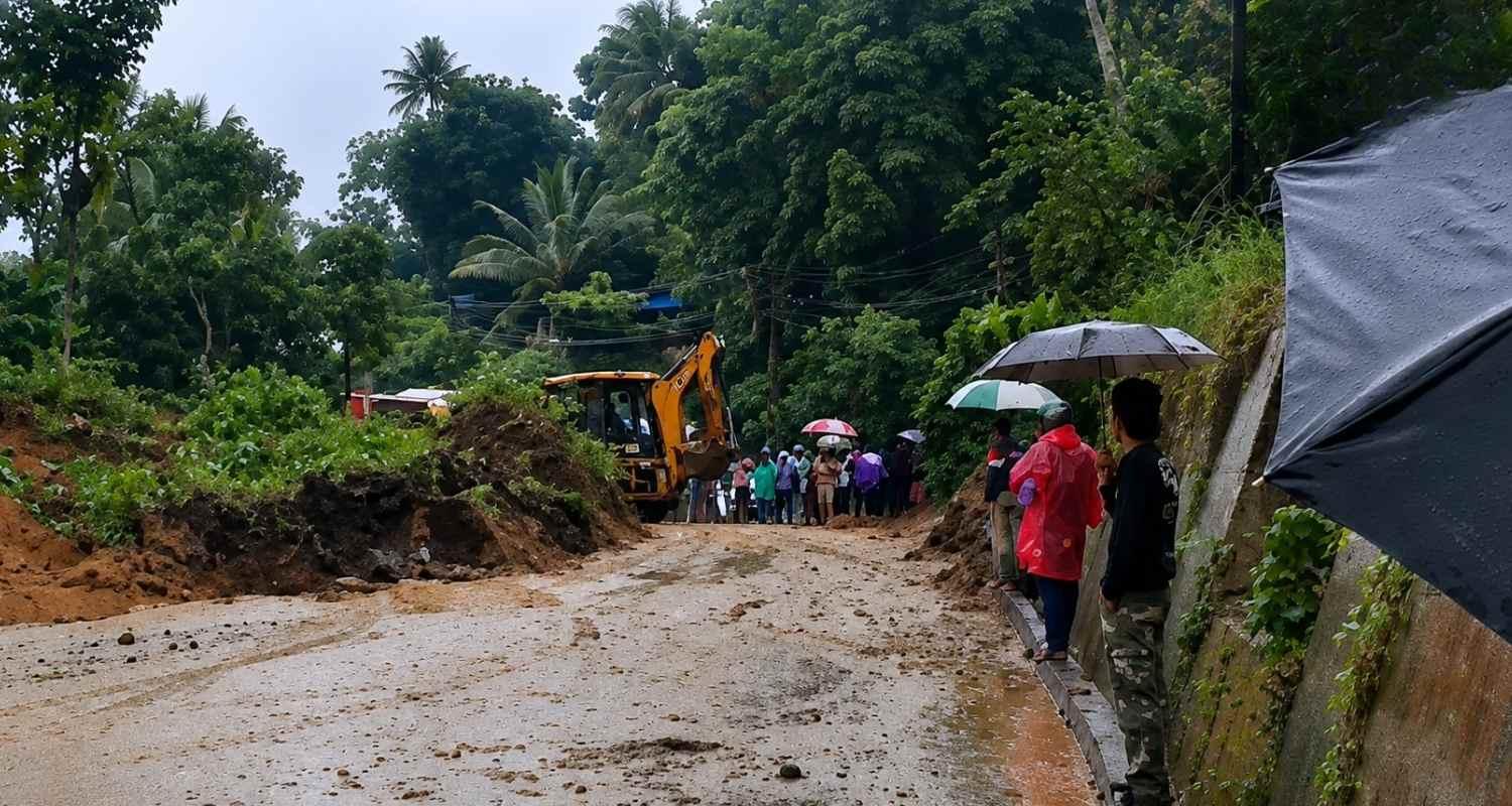 One person died and another is feared trapped after landslides hit Keralam's Idukki district, while the IMD issued red alerts for heavy rain and storms. One person died and another is feared trapped after landslides hit Keralam's Idukki district, while the IMD issued red alerts for heavy rain and storms.