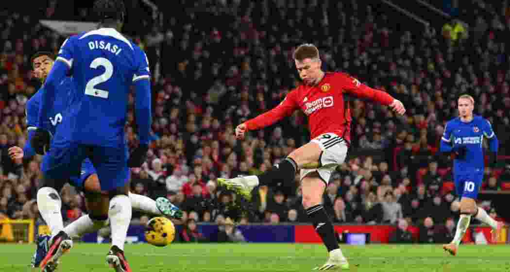 Scott McTominay takes a shot at goal against Chelsea. Scott McTominay takes a shot at goal against Chelsea.