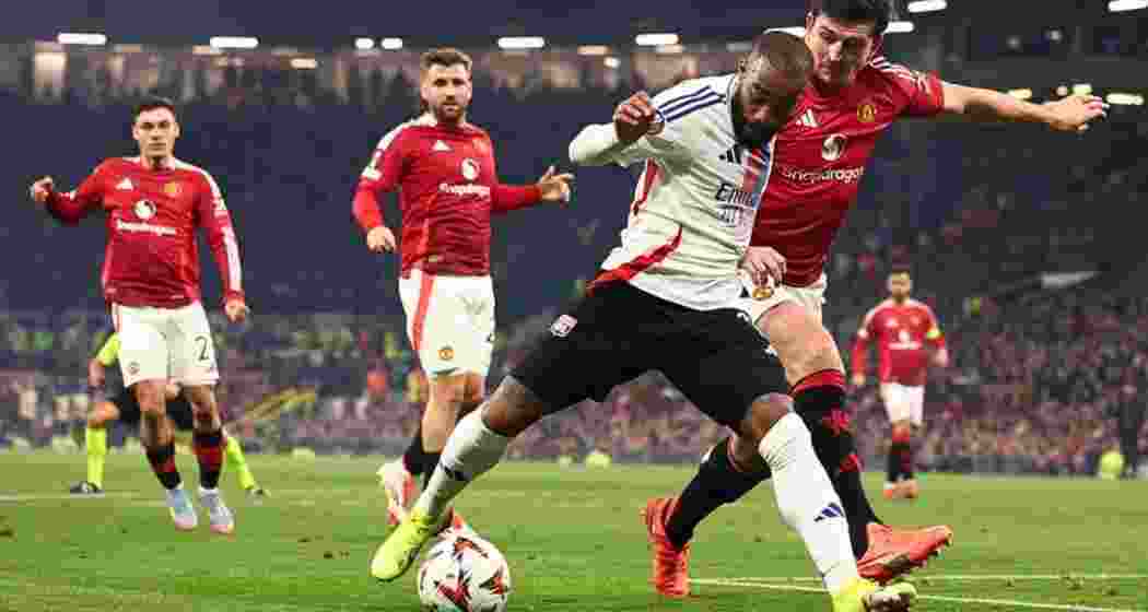Manchester United and Real Madrid players fight for the ball during an tense moment in their UEFA clash at Old Trafford on Thursday. Manchester United and Real Madrid players fight for the ball during an tense moment in their UEFA clash at Old Trafford on Thursday.