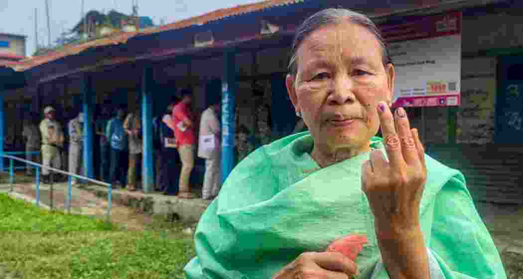 A voter shows her finger marked with indelible ink after casting her vote for Lok Sabha elections, during repolling at 11 polling stations in the Inner Manipur Lok Sabha constituency, Monday. A voter shows her finger marked with indelible ink after casting her vote for Lok Sabha elections, during repolling at 11 polling stations in the Inner Manipur Lok Sabha constituency, Monday.