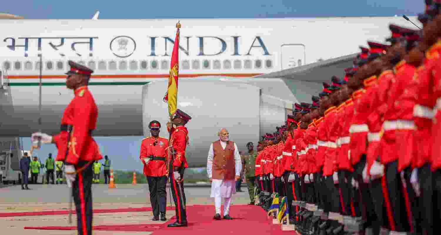Prime Minister Narendra Modi inspects a Guard of Honour during a ceremonial welcome upon his arrival at Kotoka International Airport in Accra, Ghana. Prime Minister Narendra Modi inspects a Guard of Honour during a ceremonial welcome upon his arrival at Kotoka International Airport in Accra, Ghana.