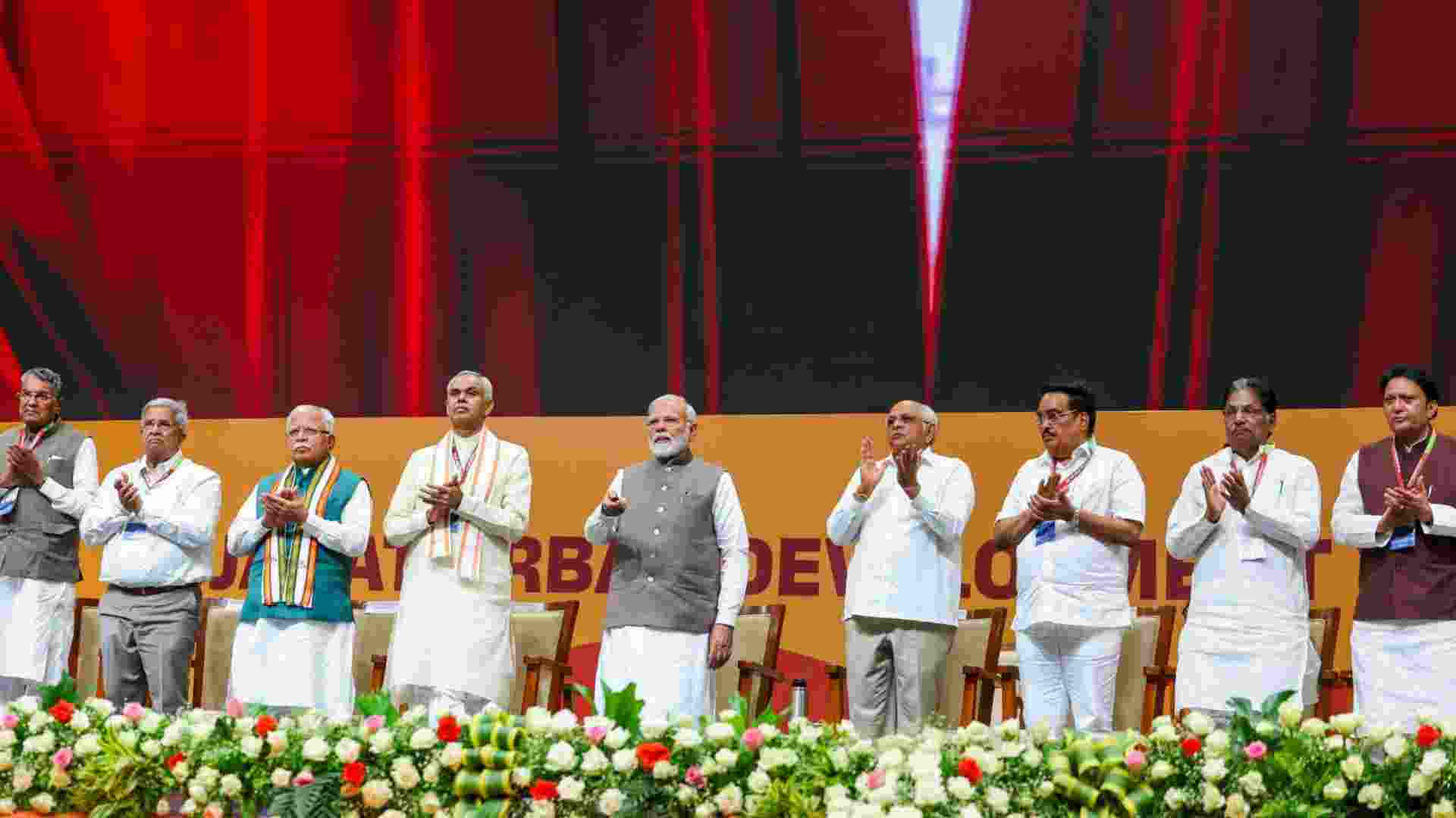 Prime Minister Narendra Modi launches the Urban Development Year, 2025 during celebration of 20 years of Gujarat's Urban Growth Story, in Gandhinagar, Tuesday. Governor Acharya Devvrat, Chief Minister Bhupendra Patel, Union Ministers Manohar Lal and C.R. Patil are also seen. Prime Minister Narendra Modi launches the Urban Development Year, 2025 during celebration of 20 years of Gujarat's Urban Growth Story, in Gandhinagar, Tuesday. Governor Acharya Devvrat, Chief Minister Bhupendra Patel, Union Ministers Manohar Lal and C.R. Patil are also seen.