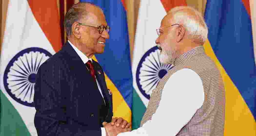 Prime Minister Narendra Modi with his Mauritius counterpart Navinchandra Ramgoolam. Prime Minister Narendra Modi with his Mauritius counterpart Navinchandra Ramgoolam.