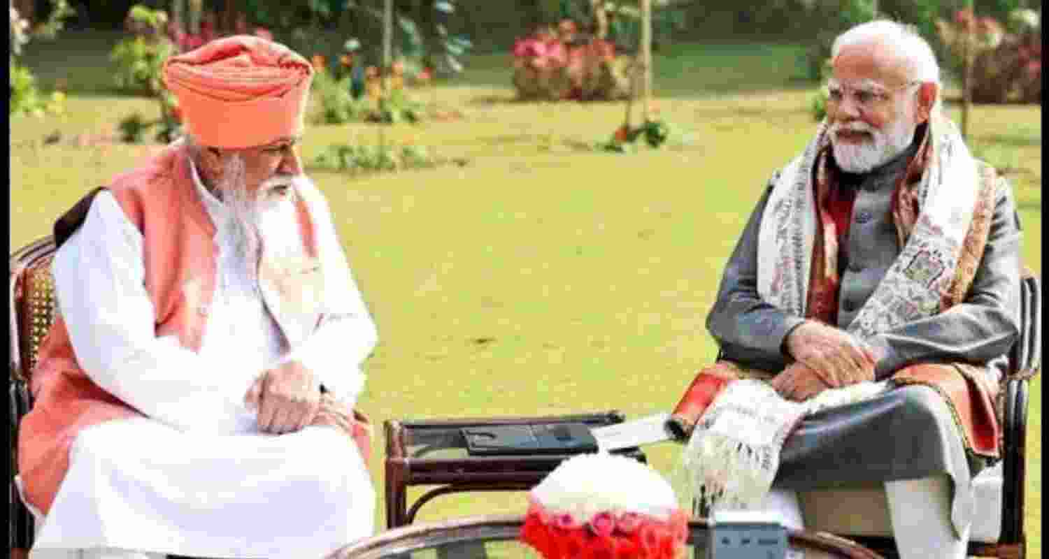 A file photo of Prime Minister Narendra Modi meeting Dera Sachkhand Ballan head Sant Niranjan Dass in New Delhi in December last year. A file photo of Prime Minister Narendra Modi meeting Dera Sachkhand Ballan head Sant Niranjan Dass in New Delhi in December last year.
