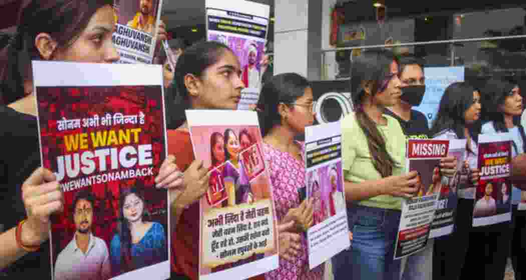 Relatives and friends of Sonam Raghuvanshi, who along with her husband Raja Raghuvanshi went missing during their honeymoon in Meghalaya, stage a protest against the Meghalaya government, in Indore, Saturday. Relatives and friends of Sonam Raghuvanshi, who along with her husband Raja Raghuvanshi went missing during their honeymoon in Meghalaya, stage a protest against the Meghalaya government, in Indore, Saturday.