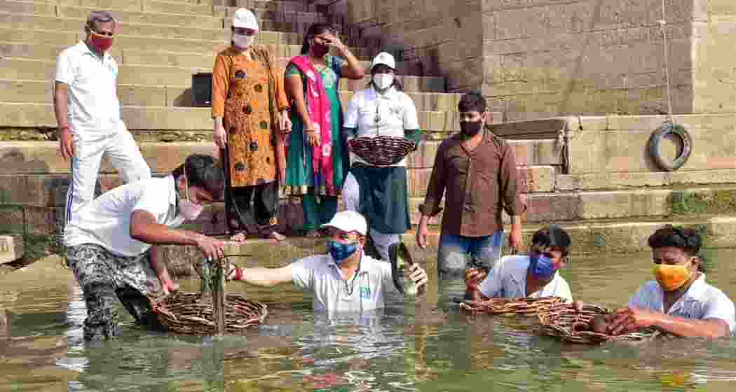 Volunteers engaged in cleaning operations along a the Ganga riverbank as part of ongoing efforts to reduce pollution and restore river ecology. Volunteers engaged in cleaning operations along a the Ganga riverbank as part of ongoing efforts to reduce pollution and restore river ecology.