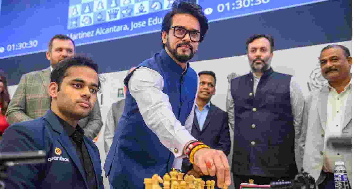 BJP leader Anurag Thakur with Grandmaster Arjun Erigaisi at the FIDE World Cup as All India Chess Federation president Nitin Narang (second from right) looks on. BJP leader Anurag Thakur with Grandmaster Arjun Erigaisi at the FIDE World Cup as All India Chess Federation president Nitin Narang (second from right) looks on.