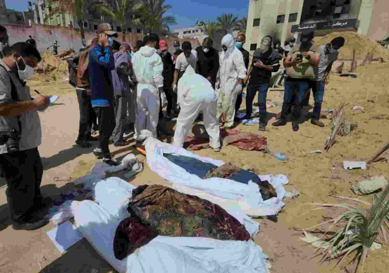 Dozens of decomposed bodies found buried at Nasser Hospital in Gaza after Israeli raid Dozens of decomposed bodies found buried at Nasser Hospital in Gaza after Israeli raid