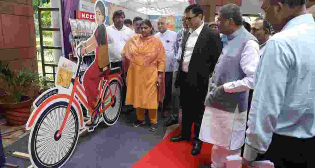 Union Education Minister Dharmendra Pradhan at an exhibition. Union Education Minister Dharmendra Pradhan at an exhibition.