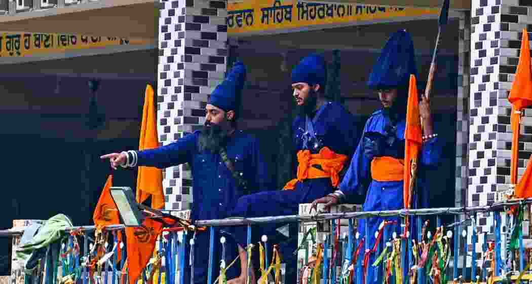 Nihangs could be seen inside the gurdwara sahib in Rudraprayag during the standoff after they allegedly stormed the shrine and held the manager hostage on the roof. Nihangs could be seen inside the gurdwara sahib in Rudraprayag during the standoff after they allegedly stormed the shrine and held the manager hostage on the roof.
