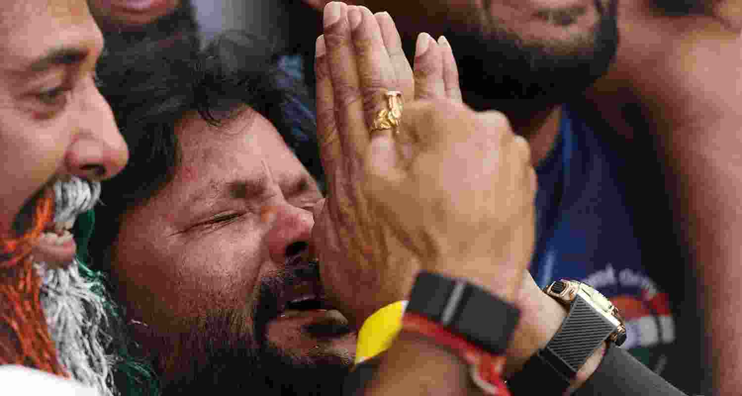 In an emotional moment, Nitish Reddy's father celebrates his son's maiden test century. In an emotional moment, Nitish Reddy's father celebrates his son's maiden test century.