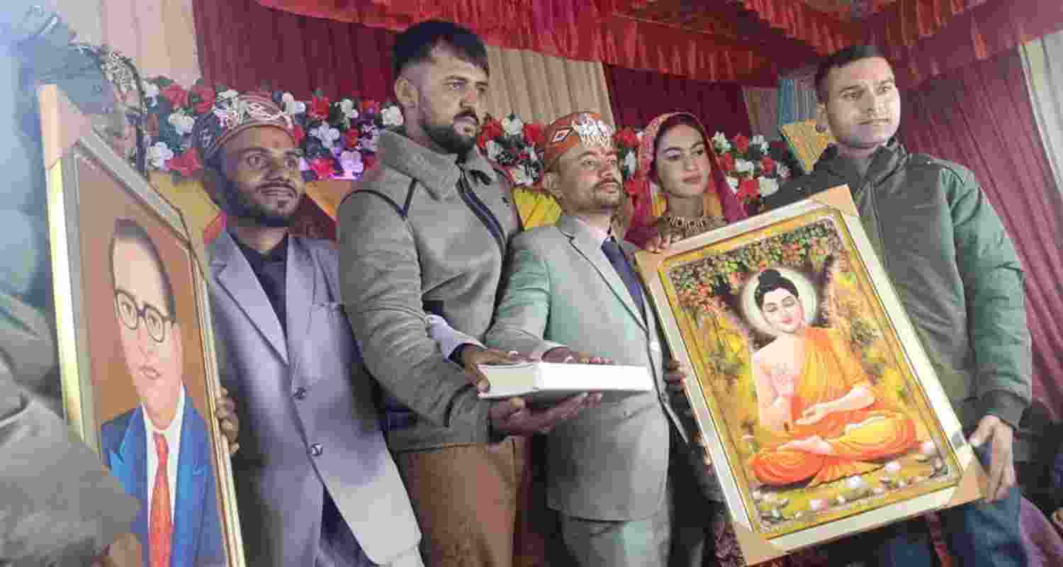 No vows, no priest, no sacred fire — just the Constitution and Ambedkar’s portrait as witnesses to the marriage of two brothers in Kalog village, Sirmaur district. No vows, no priest, no sacred fire — just the Constitution and Ambedkar’s portrait as witnesses to the marriage of two brothers in Kalog village, Sirmaur district.