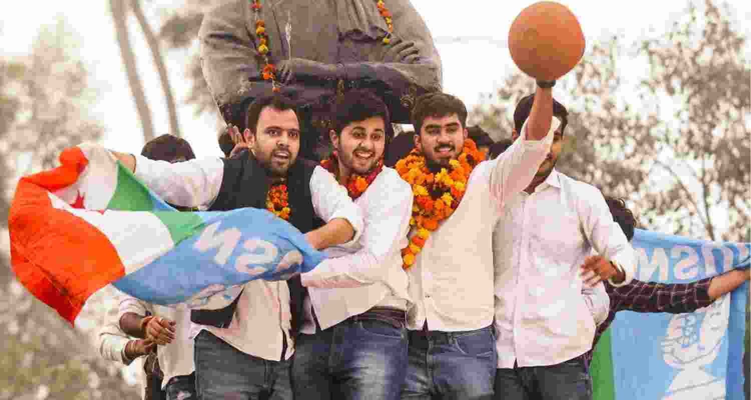 Newly elected DUSU President Ronak Khatri of NSUI, Joint Secretary Lokesh Chaudhari and others pose for photographs as they celebrate after their win in Delhi University Students Union (DUSU) 2024 elections at Delhi University. Newly elected DUSU President Ronak Khatri of NSUI, Joint Secretary Lokesh Chaudhari and others pose for photographs as they celebrate after their win in Delhi University Students Union (DUSU) 2024 elections at Delhi University.