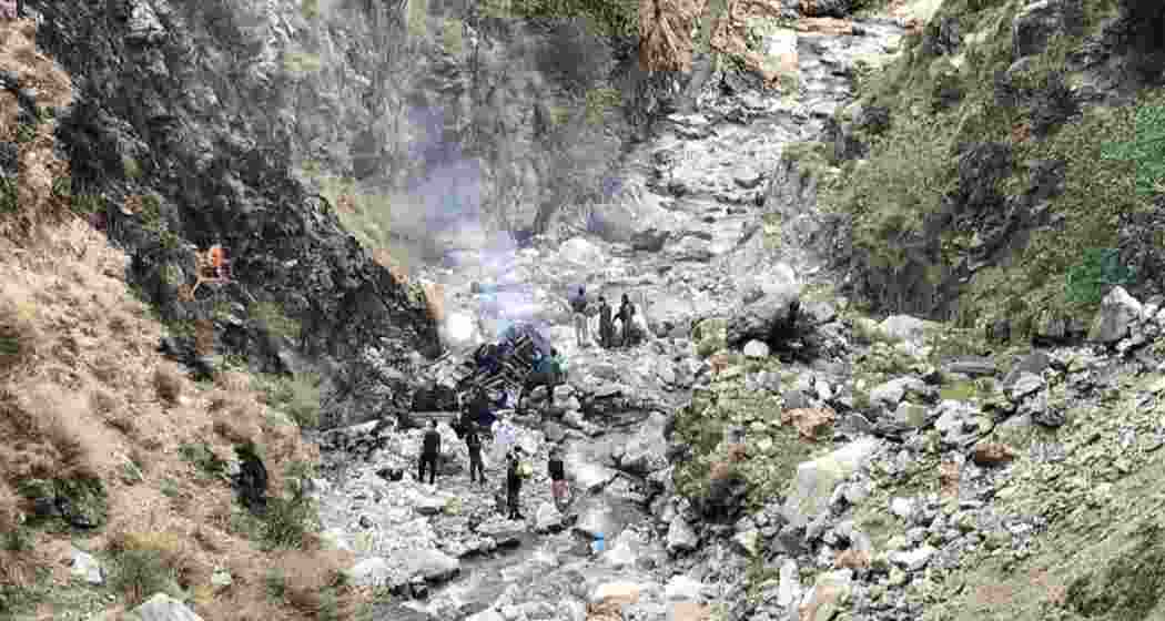 Security officials inspect the wreckage of a vehicle that was carrying Chinese nationals that plunged into a deep ravine off the mountainous Karakoram Highway after a suicide attack near Besham city in the Shangla district of Khyber Pakhtunkhwa province on March 26, 2024. Security officials inspect the wreckage of a vehicle that was carrying Chinese nationals that plunged into a deep ravine off the mountainous Karakoram Highway after a suicide attack near Besham city in the Shangla district of Khyber Pakhtunkhwa province on March 26, 2024.