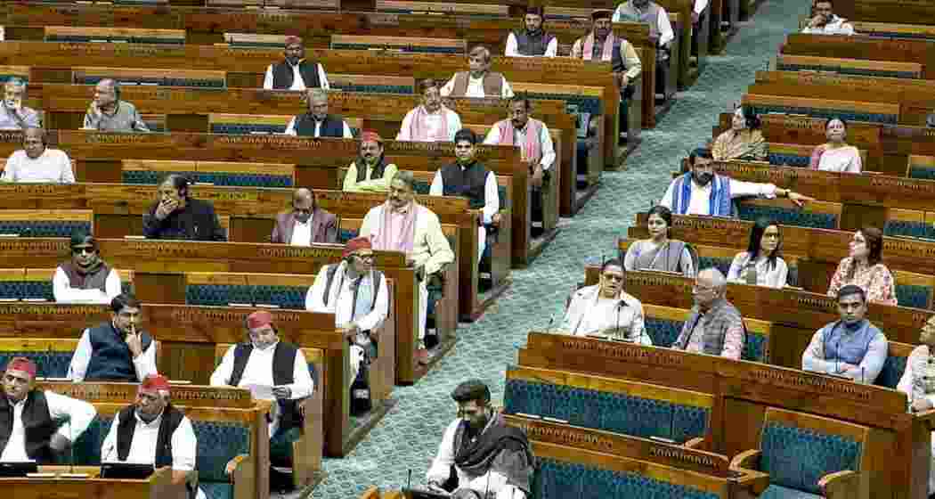 From left, in front row, Samajwadi Party President Akhilesh Yadav with his party leaders and Union Minister and Lok Janshakti Party (Ram Vilas) chief Chirag Paswan and other members in the well on the first day of the Winter Session of Parliament, in New Delhi. From left, in front row, Samajwadi Party President Akhilesh Yadav with his party leaders and Union Minister and Lok Janshakti Party (Ram Vilas) chief Chirag Paswan and other members in the well on the first day of the Winter Session of Parliament, in New Delhi.