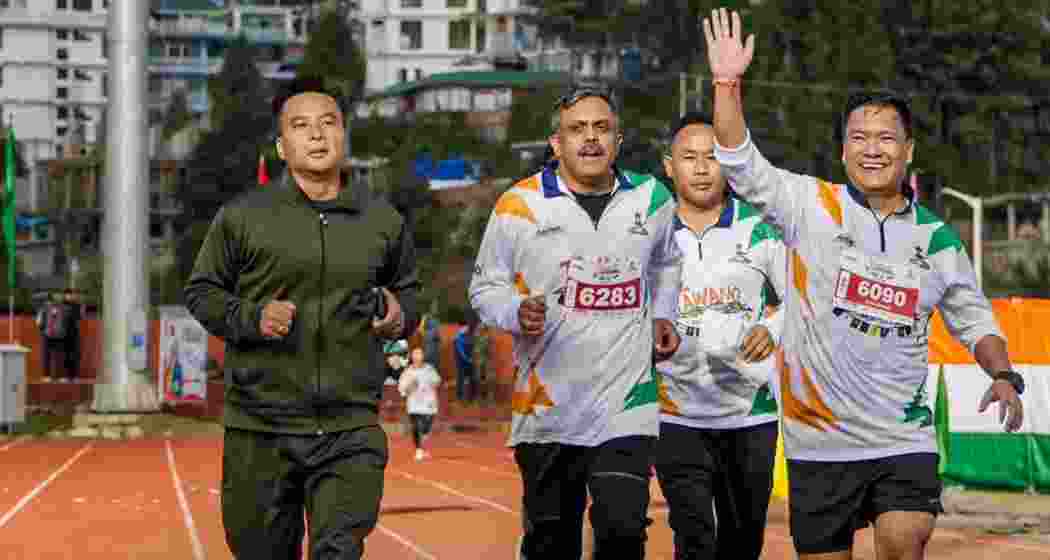Arunachal Pradesh Chief Minister Pema Khandu (right) participates in the Tawang Marathon, in Tawang on Oct. 1, 2023. Arunachal Pradesh Chief Minister Pema Khandu (right) participates in the Tawang Marathon, in Tawang on Oct. 1, 2023.