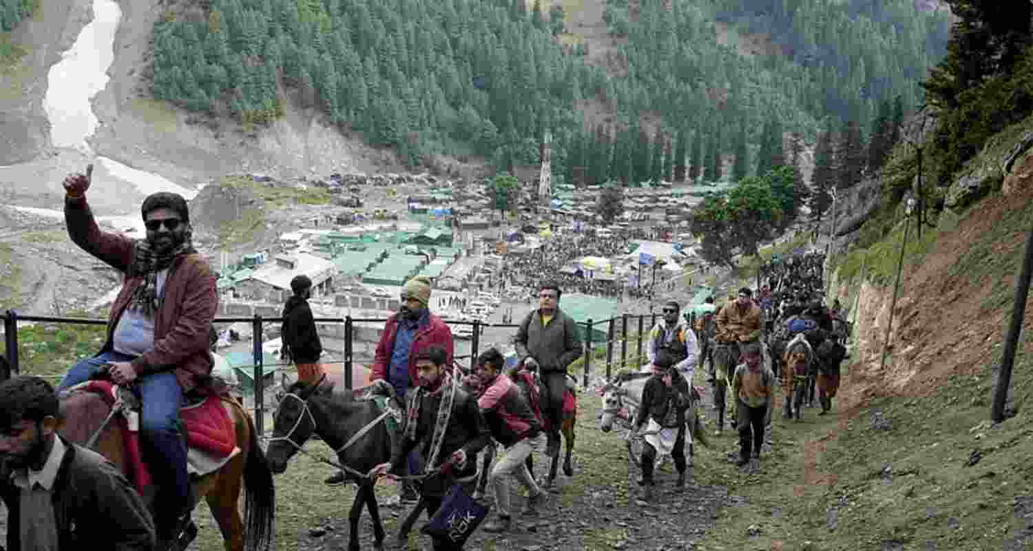 Pilgrims on their way to the holy cave shrine of Amarnath. Pilgrims on their way to the holy cave shrine of Amarnath.