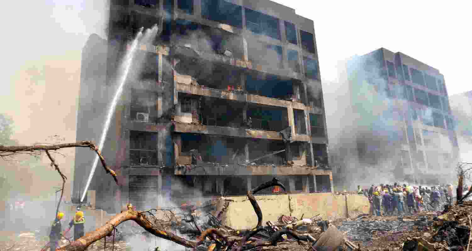 Firefighting team at the spot after an Air India plane crashed in Meghaninagar area, near Ahmedabad airport, Thursday. Firefighting team at the spot after an Air India plane crashed in Meghaninagar area, near Ahmedabad airport, Thursday.