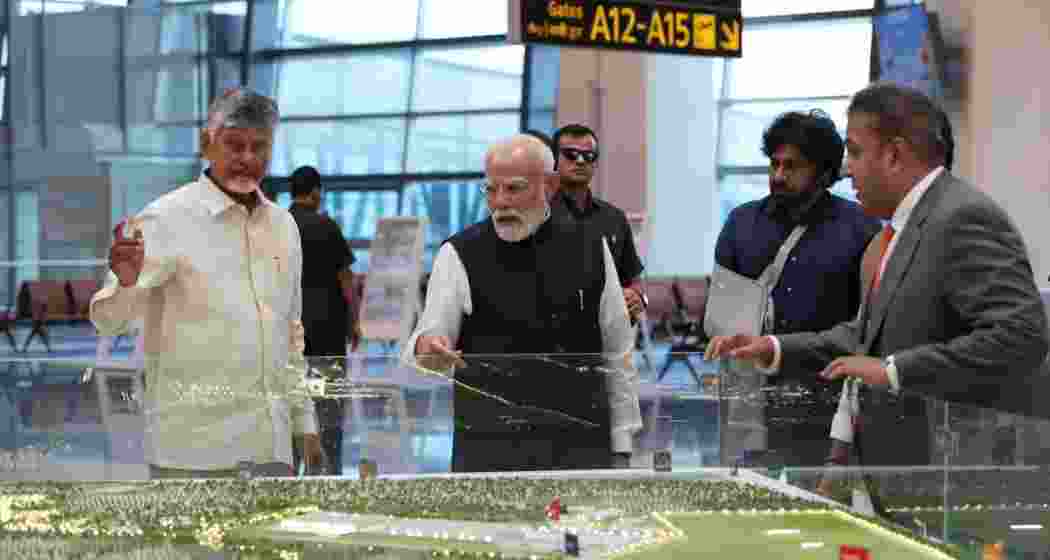 PM Narendra Modi, along with Andhra Pradesh Chief Minister N. Chandrababu Naidu (L) during the inauguration ceremony of the Alluri Sitarama Raju International Airport at Bhogapuram on Saturday. PM Narendra Modi, along with Andhra Pradesh Chief Minister N. Chandrababu Naidu (L) during the inauguration ceremony of the Alluri Sitarama Raju International Airport at Bhogapuram on Saturday.