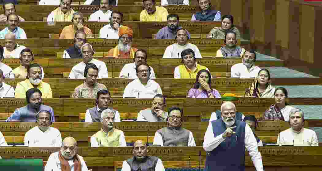 Prime Minister Narendra Modi speaks in the Lok Sabha during the Special session of Parliament, in New Delhi, on Thursday. Prime Minister Narendra Modi speaks in the Lok Sabha during the Special session of Parliament, in New Delhi, on Thursday.