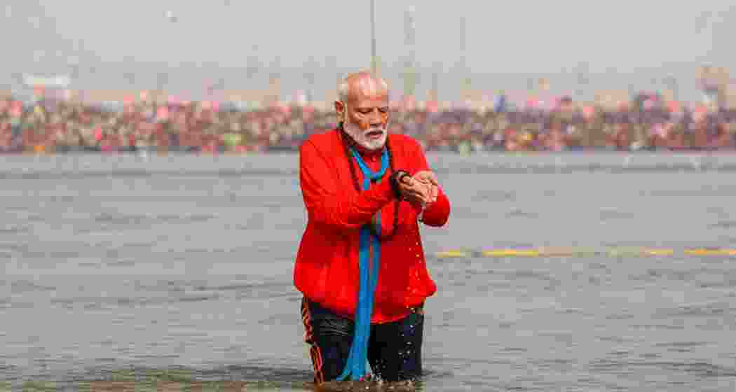 Prime Minister Narendra Modi offers prayers at Triveni Sangam during Mahakumbh 2025 in Prayagraj on Wednesday. Prime Minister Narendra Modi offers prayers at Triveni Sangam during Mahakumbh 2025 in Prayagraj on Wednesday.