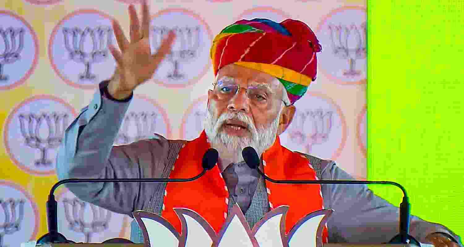 Prime Minister Narendra Modi being felicitated during a public meeting in Karauli. Prime Minister Narendra Modi being felicitated during a public meeting in Karauli.