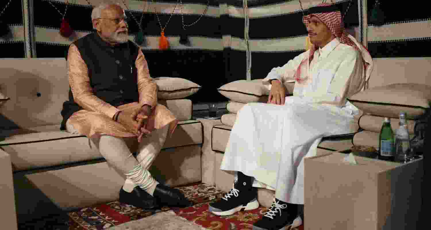 PM Modi sits with the Emir of Qatar Al thani PM Modi sits with the Emir of Qatar Al thani